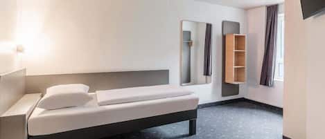 Habitación triple | Escritorio, cortinas blackout, insonorización y wifi gratis