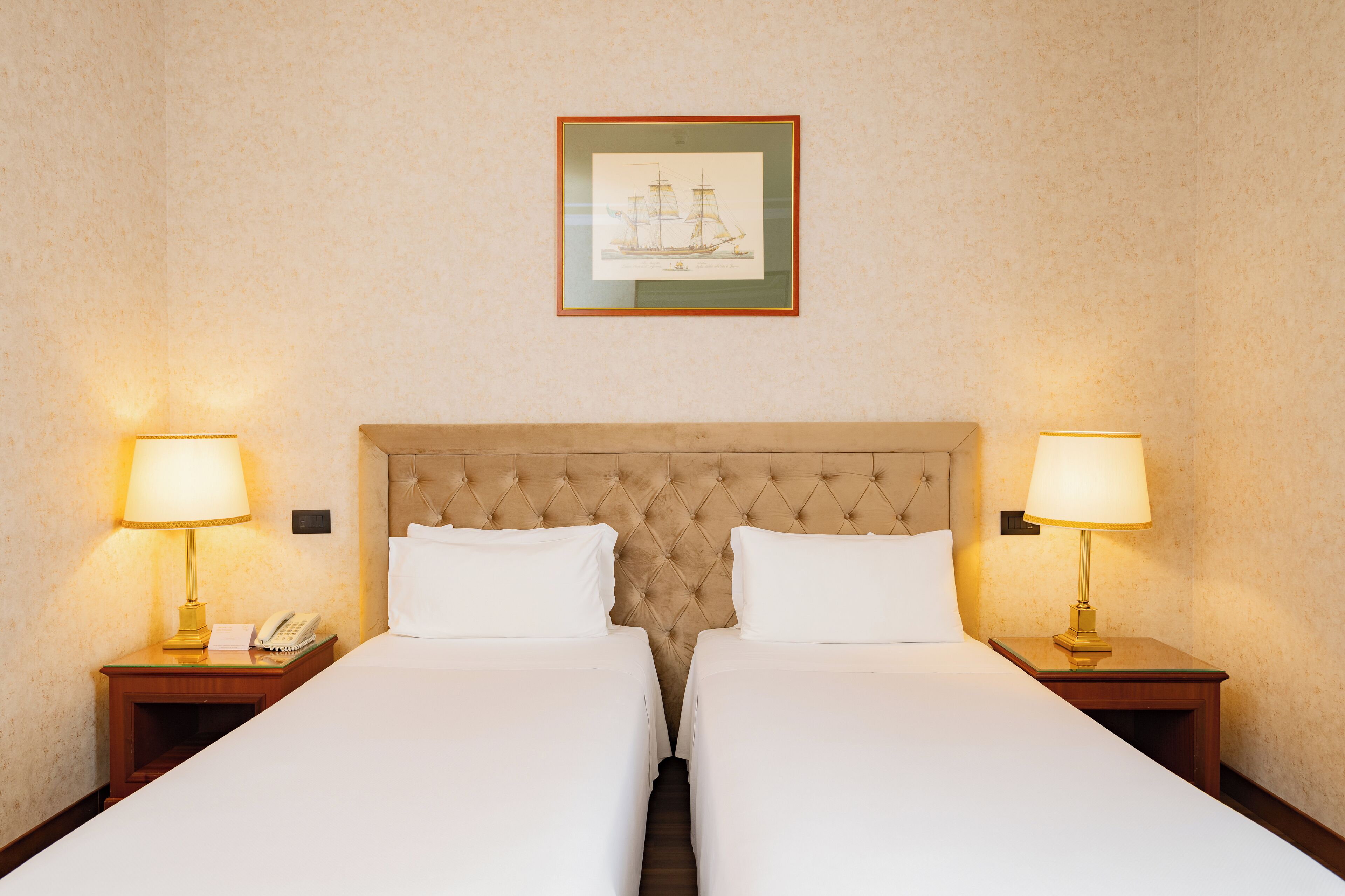 deluxe twin room | down duvets, minibar, in-room safe, blackout curtains