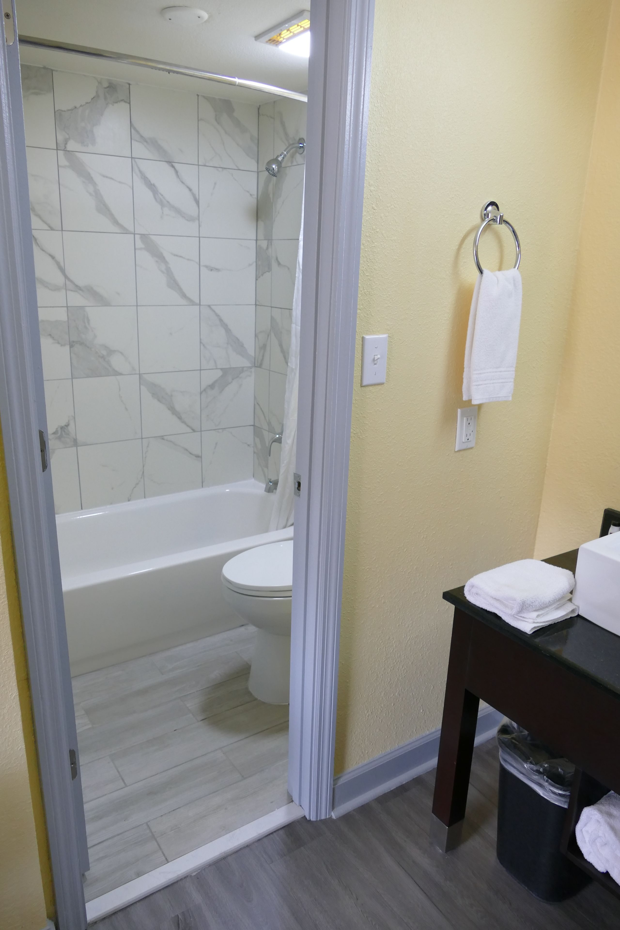 combined shower/bathtub, free toiletries, hair dryer, towels