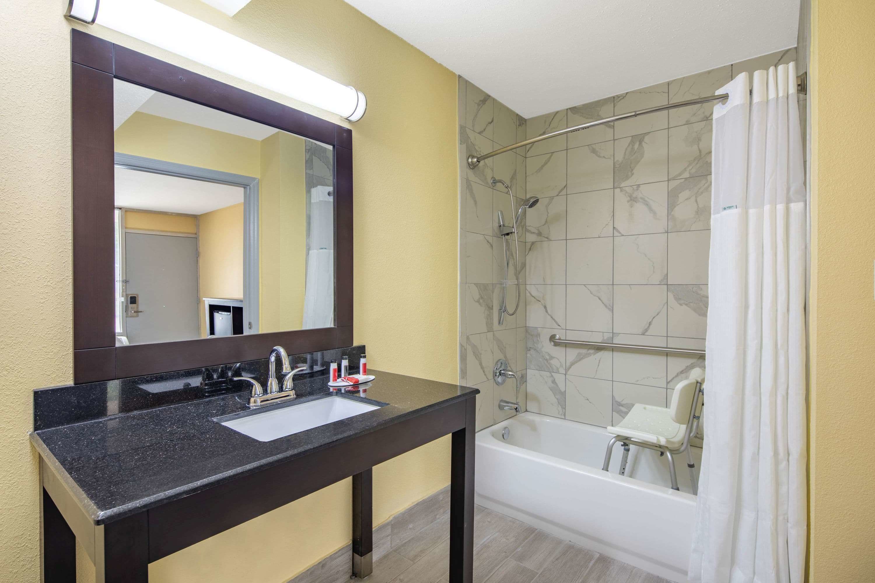 combined shower/bathtub, free toiletries, hair dryer, towels