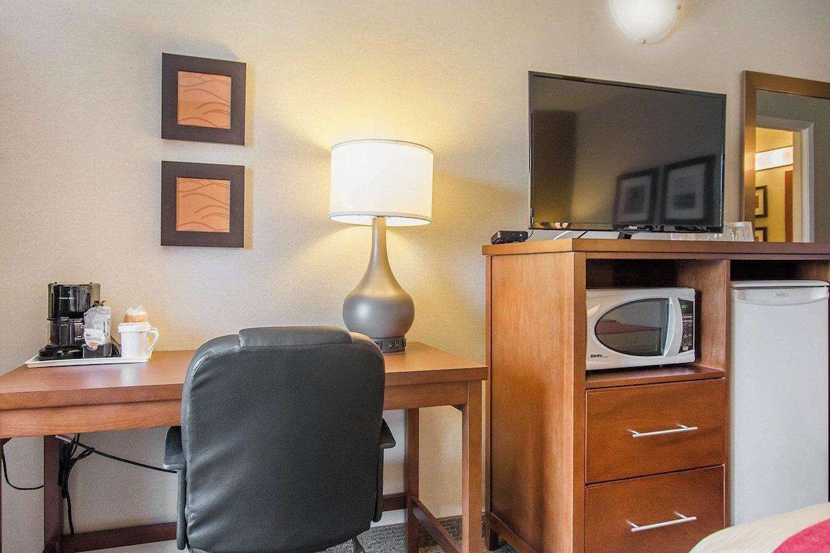 down duvets, pillow-top beds, desk, blackout curtains