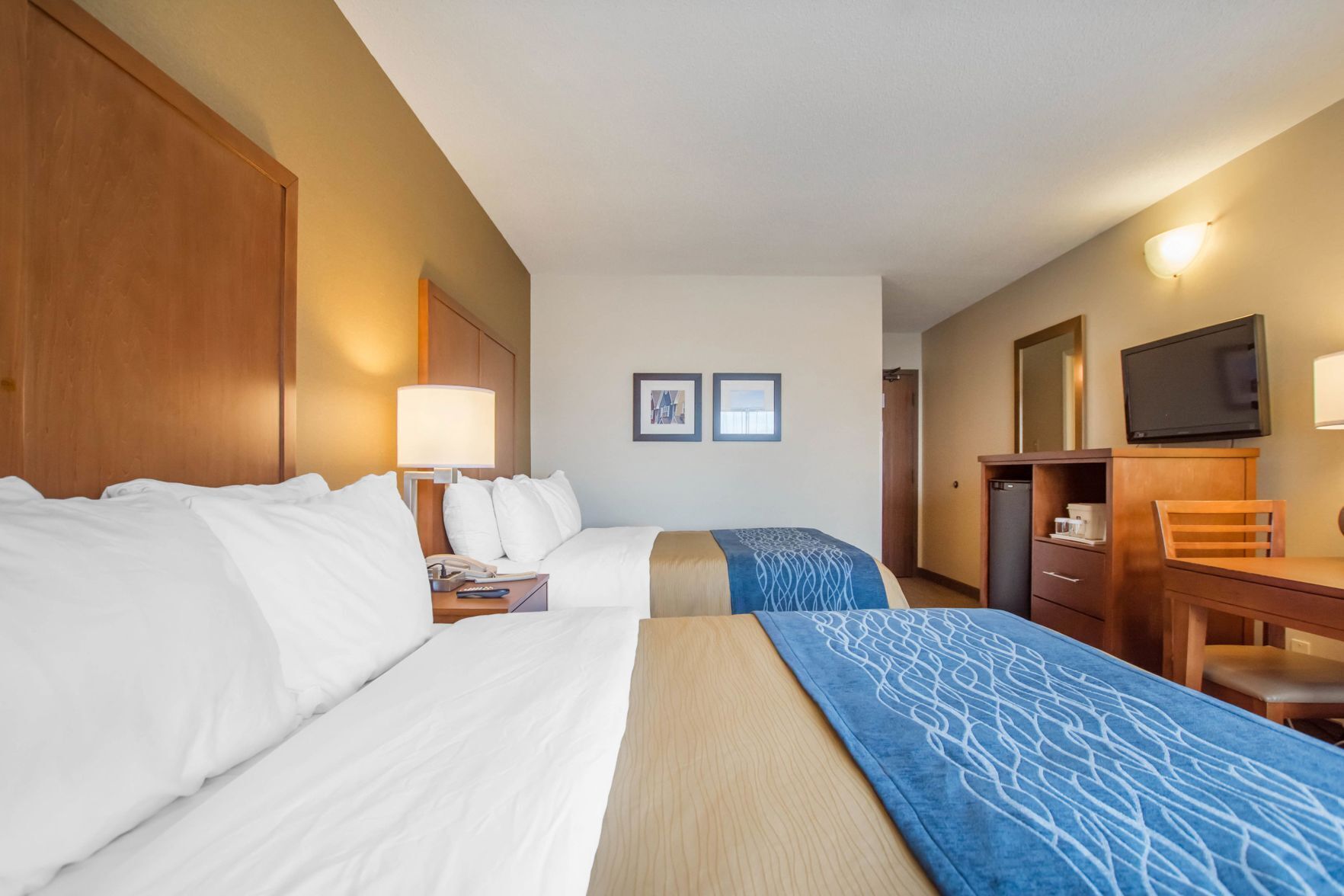 Down duvets, pillow-top beds, desk, blackout curtains