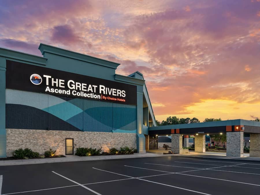A hotel with a large sign reading 'The Great Rivers Ascend Collection By Choice Hotels.'