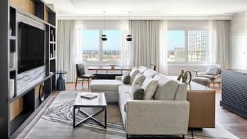 Luxury Suite, 1 King Bed with Sofa bed | Living area | 55-inch Smart TV with cable channels, TV, pay films