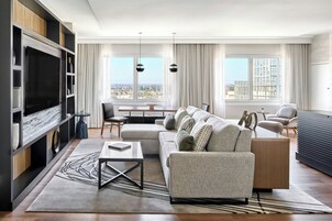 Luxury Suite, 1 King Bed with Sofa bed | Living area | 55-inch Smart TV with cable channels, TV, pay movies