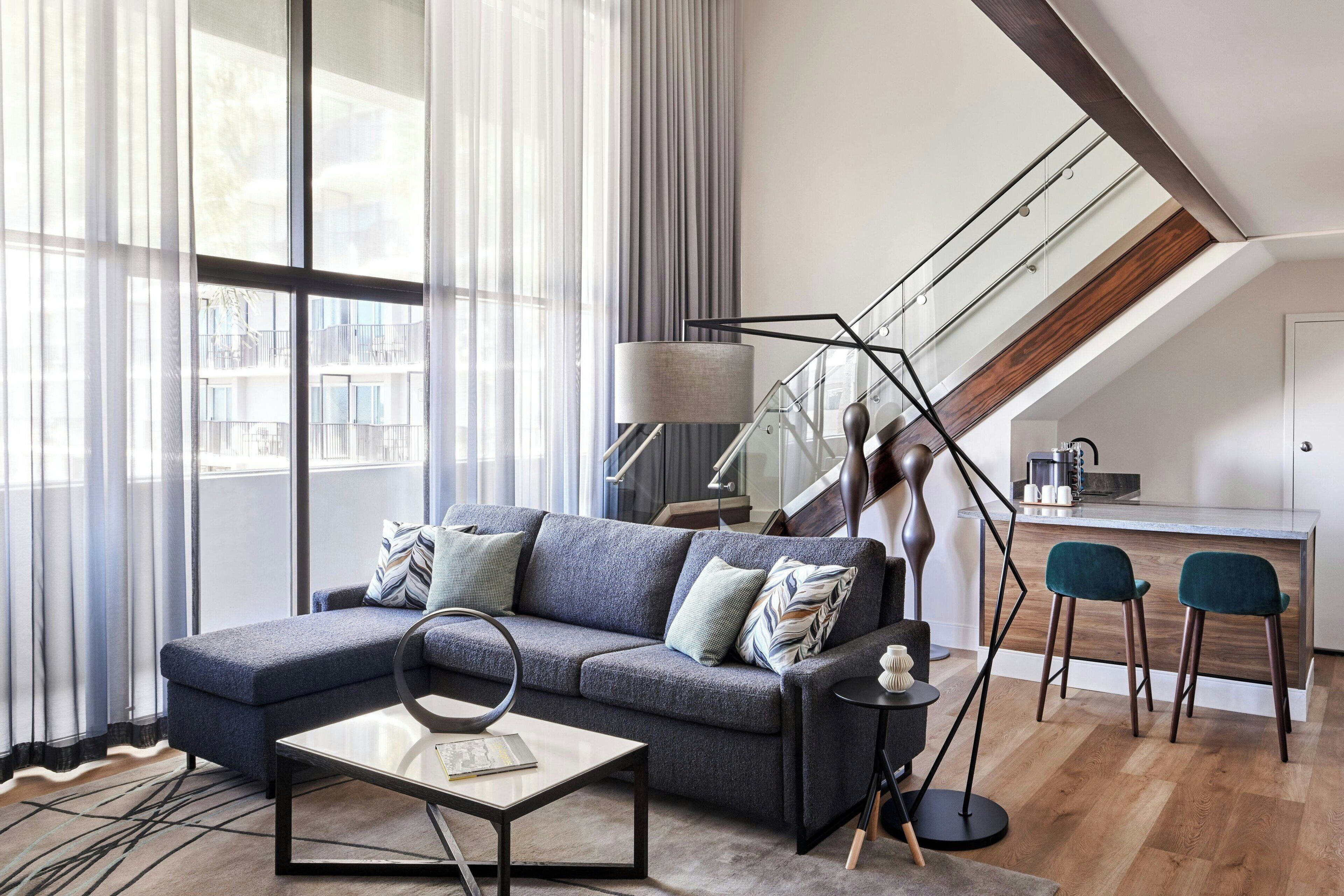 suite, 1 bedroom, non smoking | living area | 55-inch smart tv with cable channels, tv, pay films