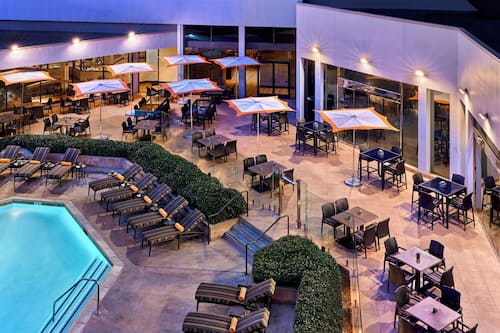Outdoor pool, pool umbrellas, pool loungers