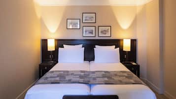 Superior kamer | Luxe beddengoed, een minibar, een kluis op de kamer