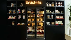 A store with shelves stocked with snacks, beverages, and condiments. - ibis Paris La Défense Esplanade (Courbevoie)