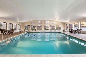 Indoor pool, open 6:00 AM to 10:00 PM, pool loungers