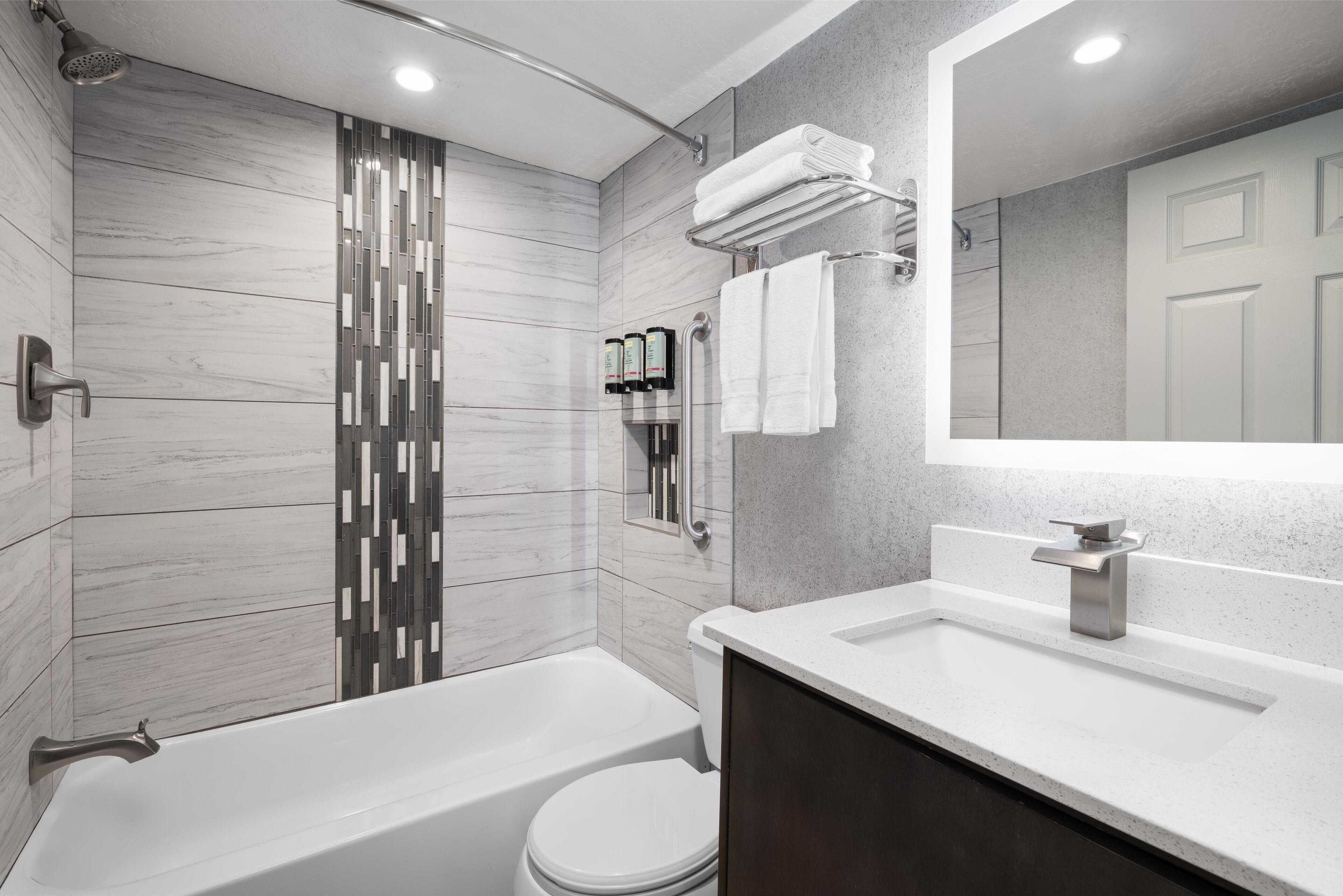 family room, multiple beds, non smoking, refrigerator & microwave | bathroom | combined shower/bathtub, free toiletries, hair dryer, towels