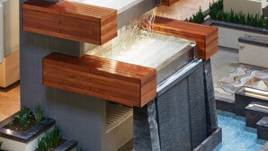 A modern indoor water feature with multiple tiers and wooden accents. - DoubleTree by Hilton Fresno Convention Center (Fresno)
