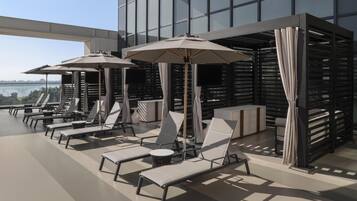 Outdoor pool, pool cabanas (surcharge), pool loungers