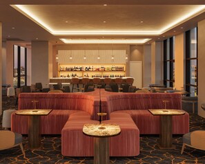 A modern bar area with a long counter, multiple seating options including sofas and chairs, and a large window providing a city view. - Manchester Grand Hyatt San Diego (San Diego)