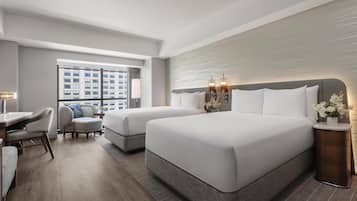 Hypo-allergenic bedding, down duvets, in-room safe, desk