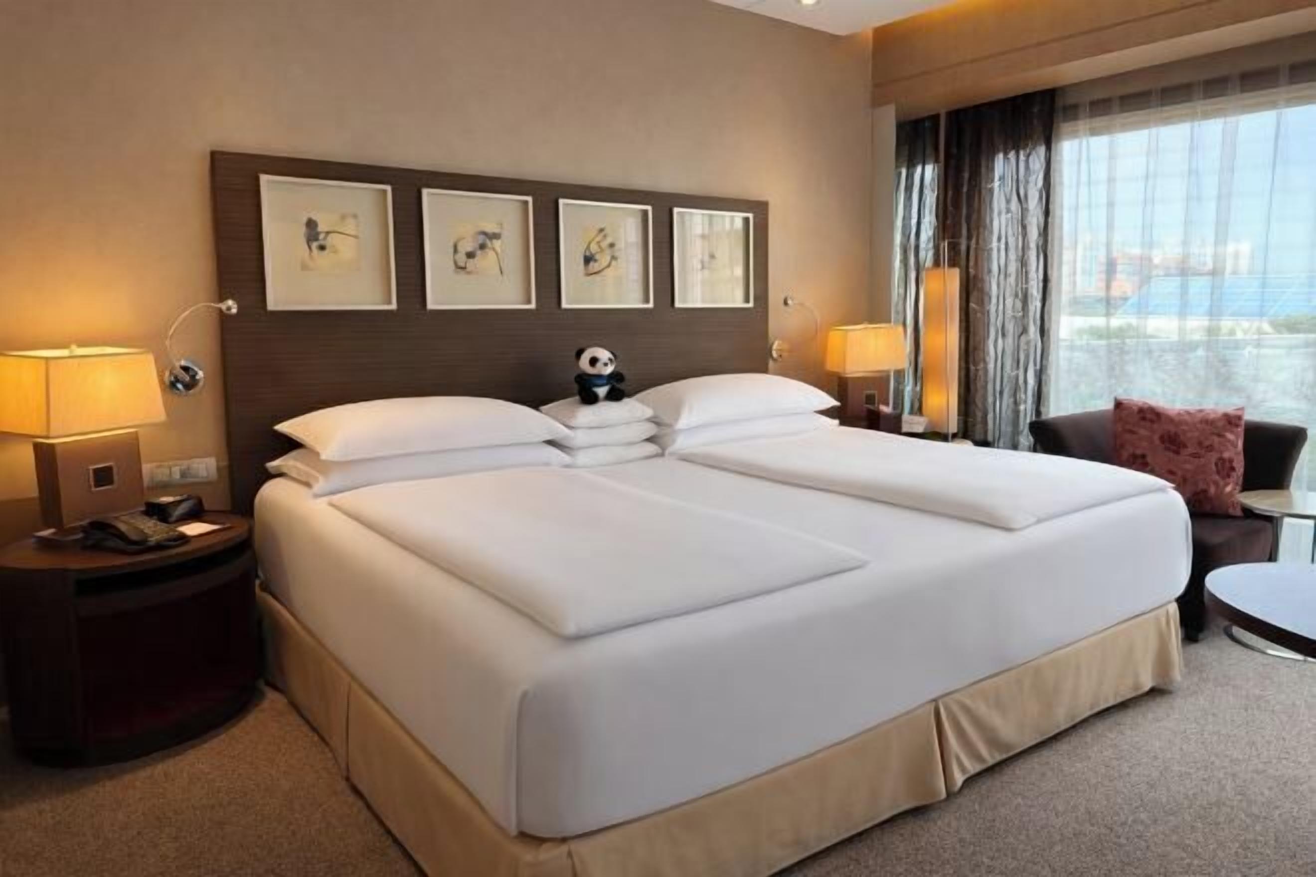 Premium bedding, down comforters, minibar, in-room safe