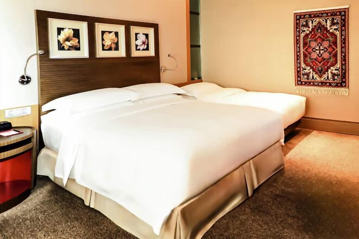 Premium bedding, down duvets, minibar, in-room safe