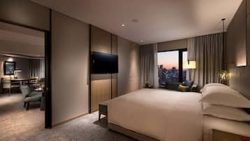 Suite Premier, 1 cama King size, balcón | Edredón, minibar y caja de seguridad en la habitación