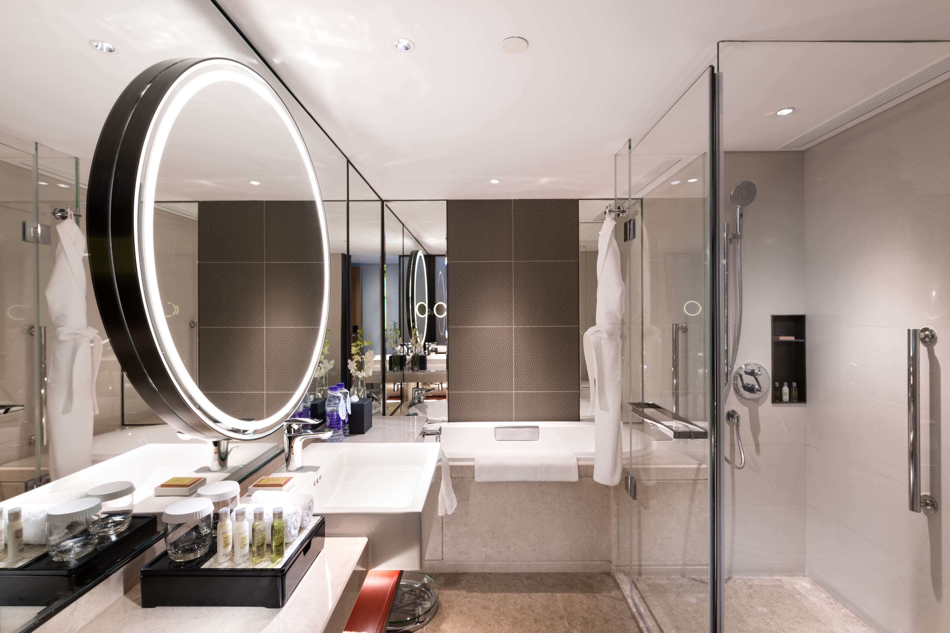 separate bathtub and shower, designer toiletries, hair dryer, bathrobes