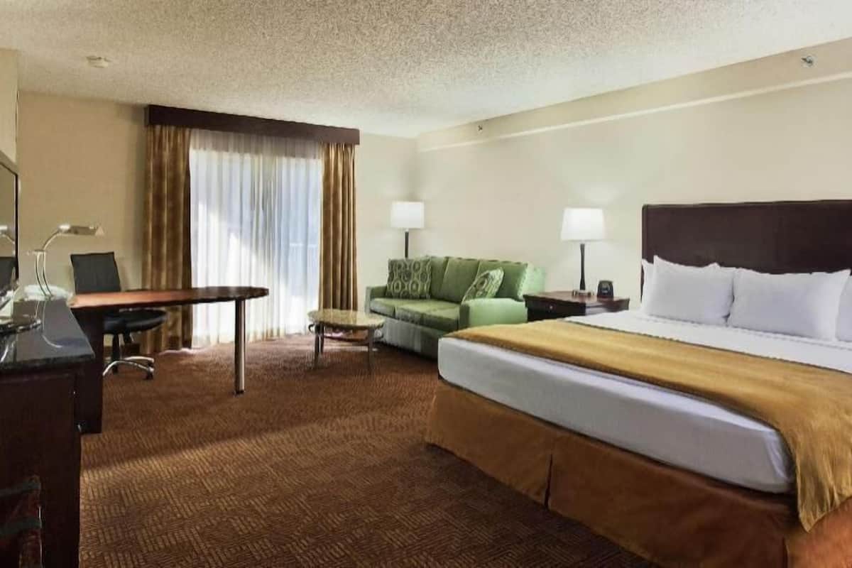 Hypo-allergenic bedding, down comforters, pillowtop beds, in-room safe