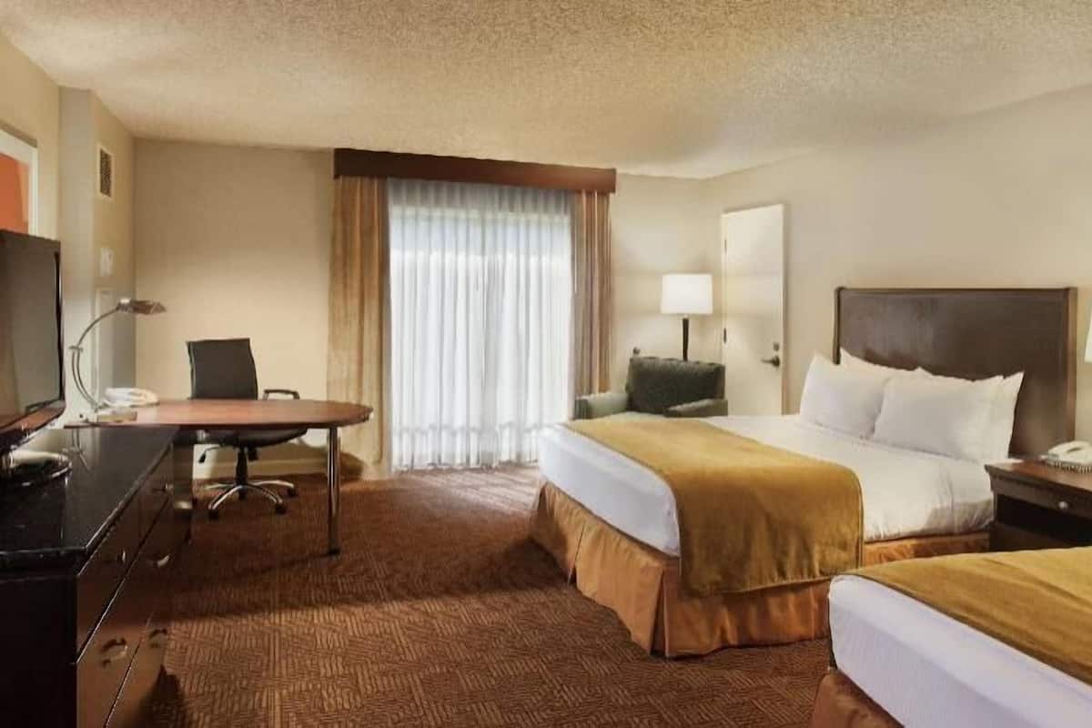 Hypo-allergenic bedding, down comforters, pillowtop beds, in-room safe