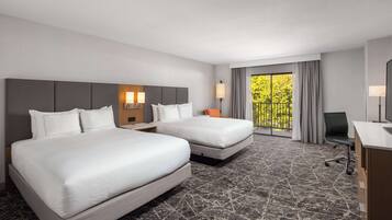 Hypo-allergenic bedding, down comforters, pillowtop beds, in-room safe