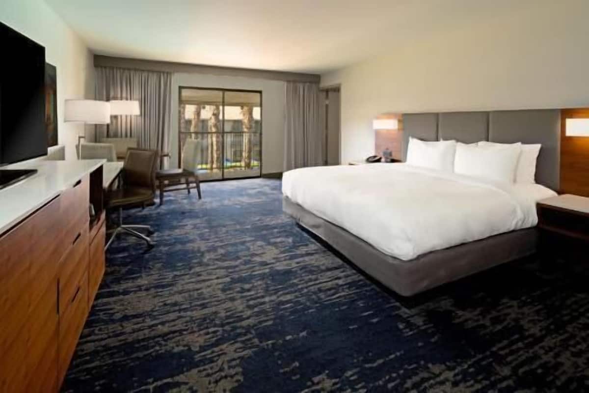 Hypo-allergenic bedding, down comforters, pillowtop beds, in-room safe