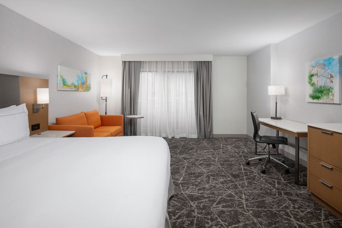 Hypo-allergenic bedding, down duvets, pillow-top beds, in-room safe