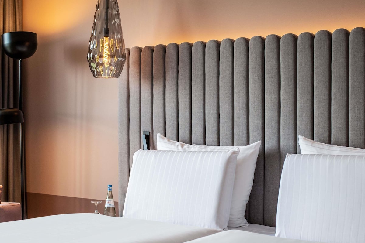 Biancheria da letto di alta qualità, minibar, cassaforte in camera