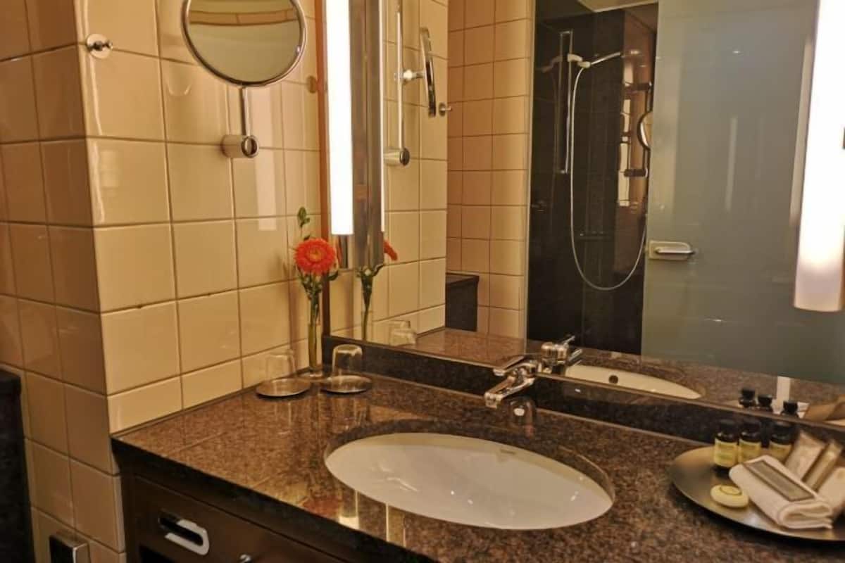 Eco-friendly toiletries, hair dryer, bathrobes, slippers