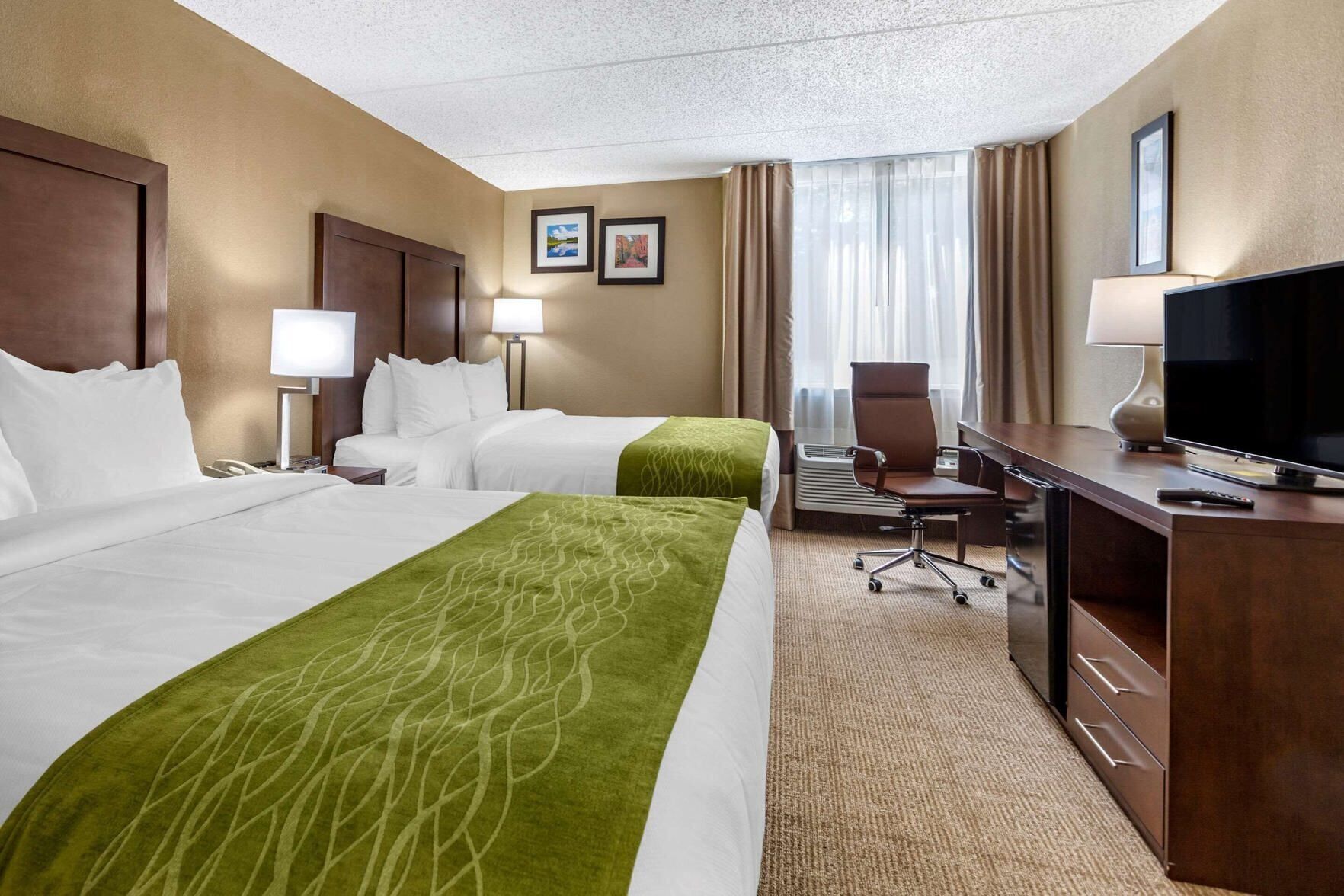 Premium bedding, pillowtop beds, desk, blackout drapes