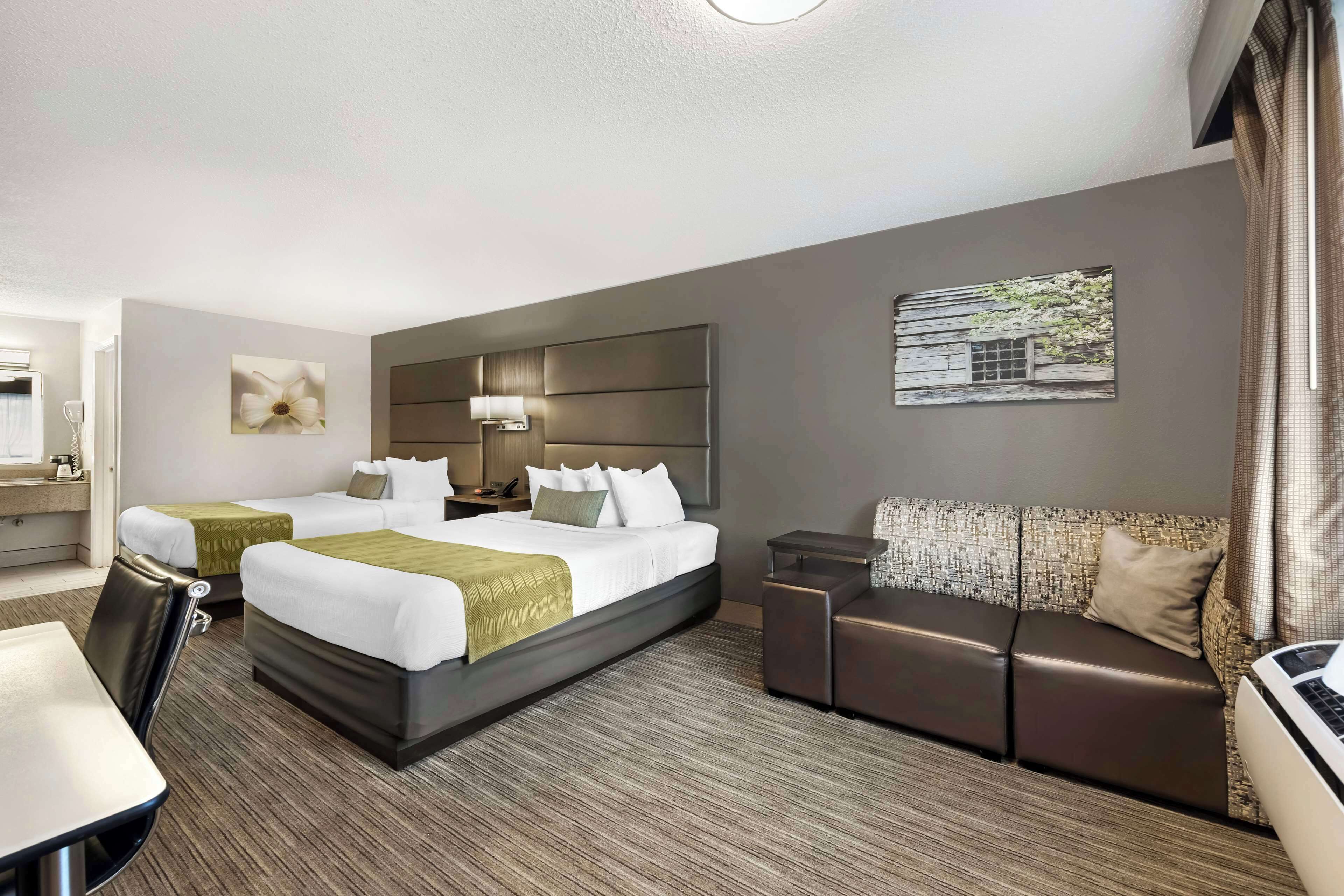 standard room, 2 queen beds, non smoking (pet friendly) | in-room safe, individually decorated, individually furnished, desk