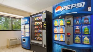 A vending machine area with Pepsi and other beverage options, including a selection of juices and sodas.