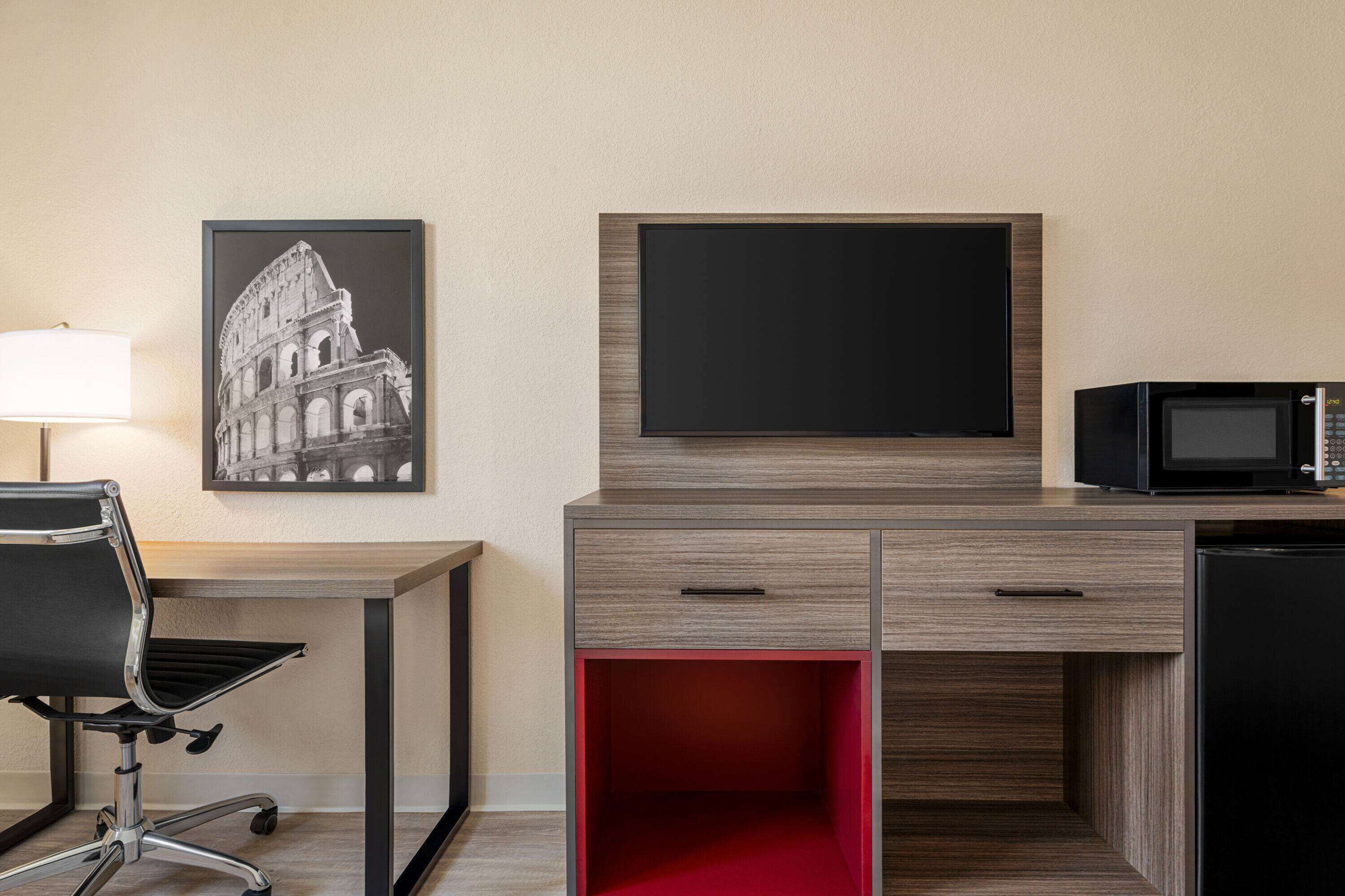 desk, blackout curtains, iron/ironing board, free cots/infant beds