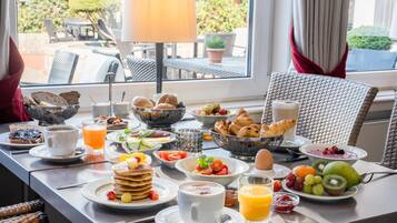 Daily buffet breakfast (EUR 19 per person)