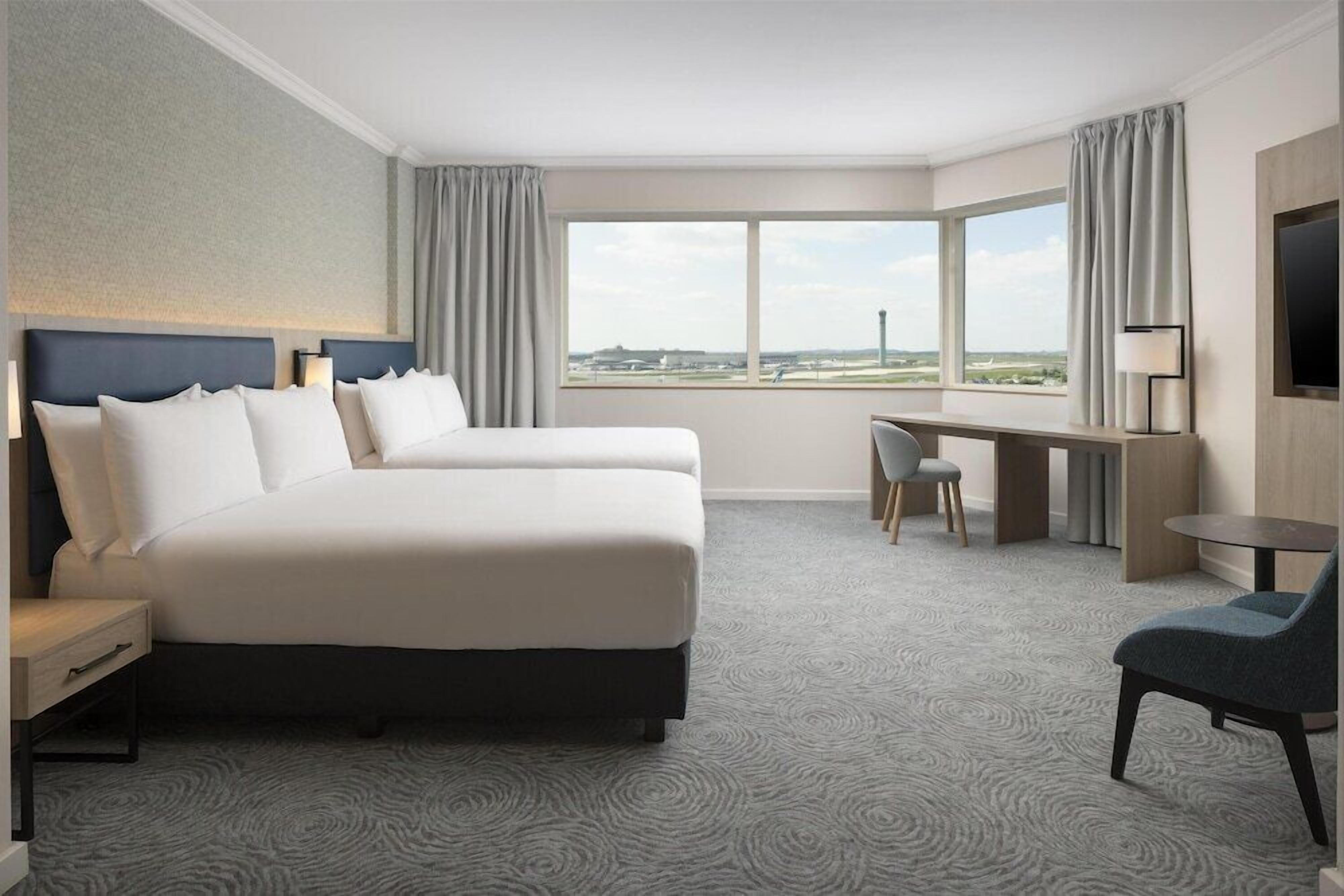 Premium bedding, in-room safe, laptop workspace, blackout curtains