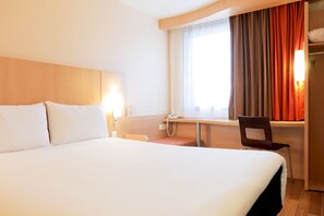 Premium bedding, pillow-top beds, desk, blackout curtains