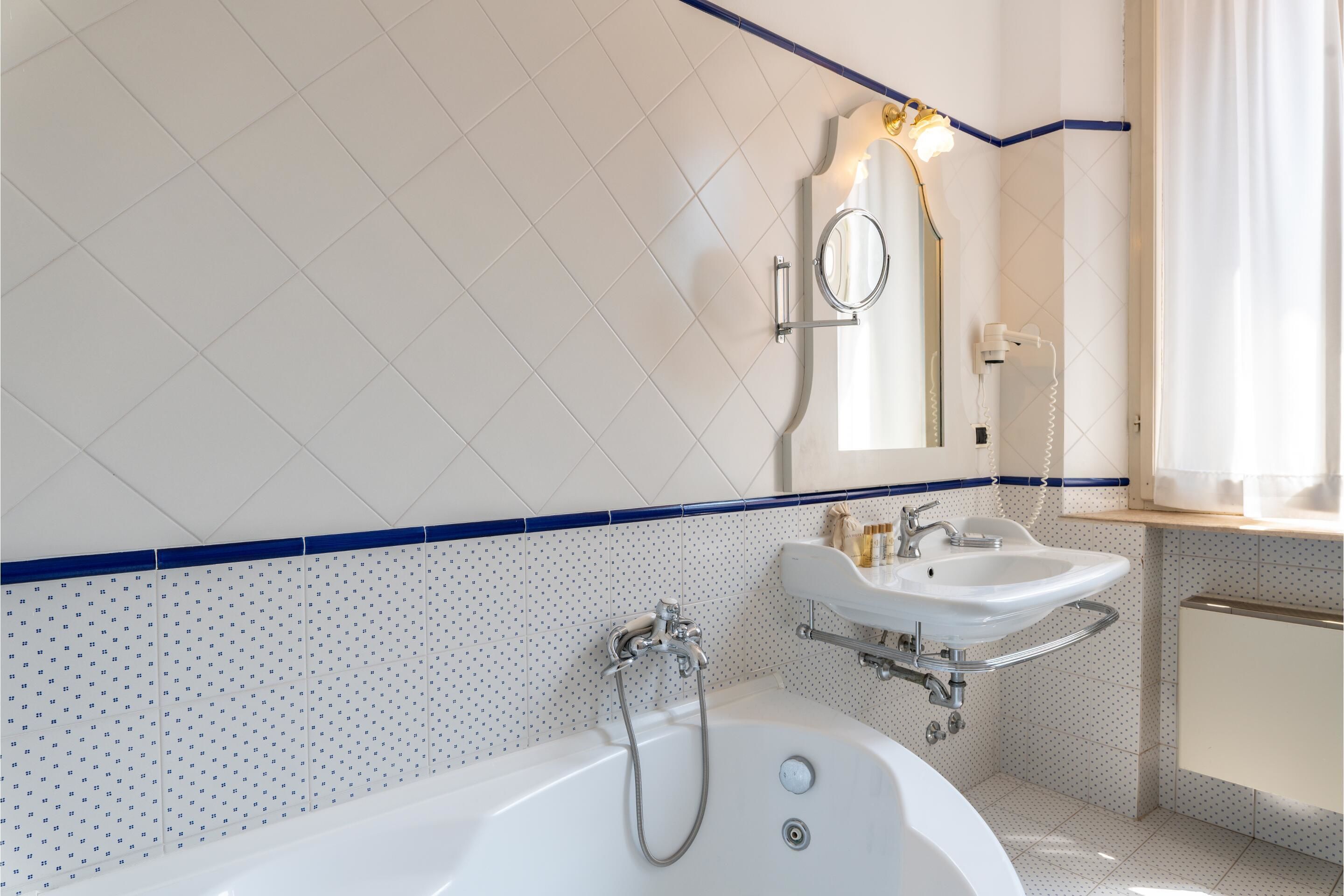 shower, rainfall showerhead, free toiletries, hair dryer