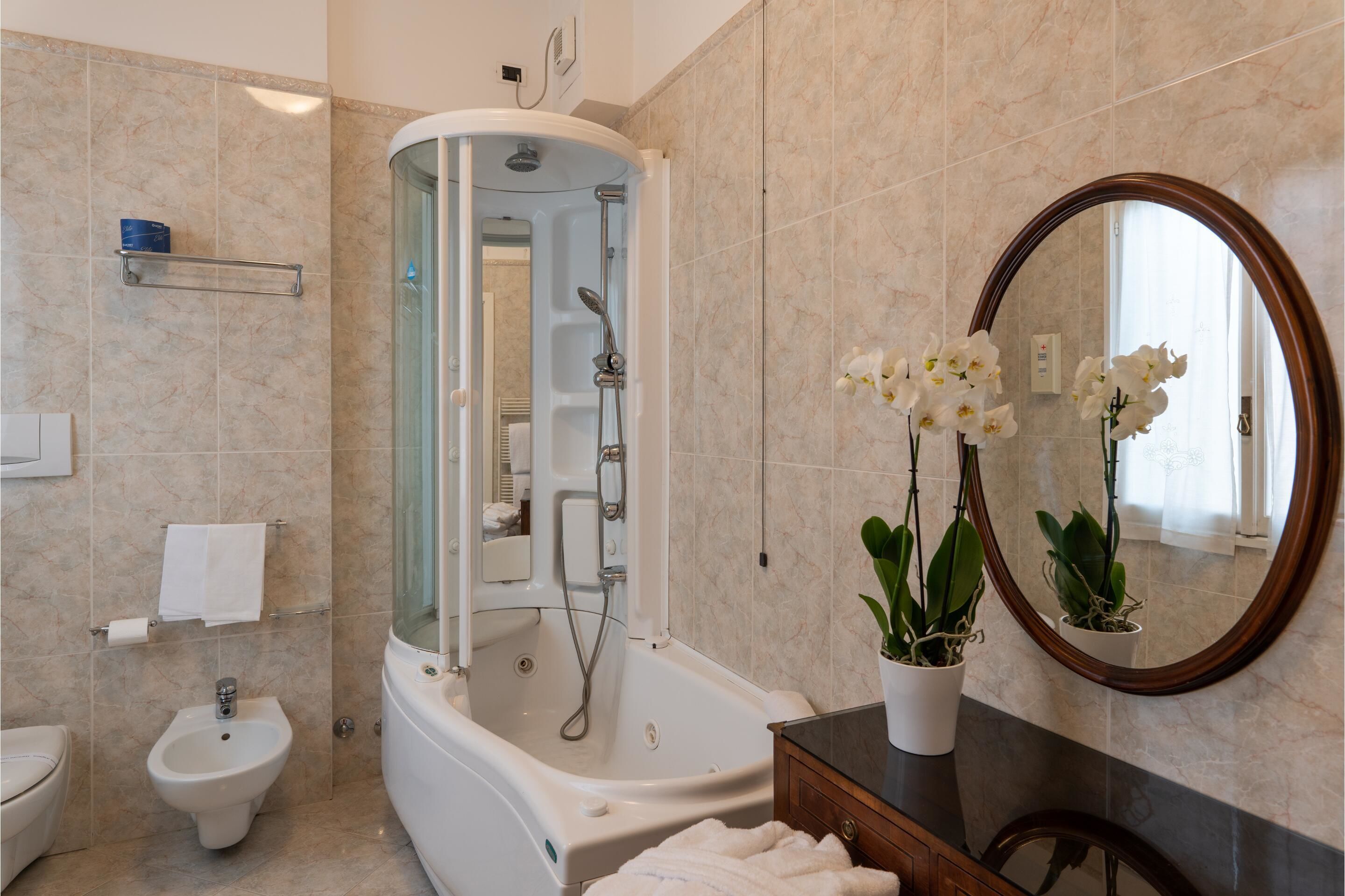 junior suite | bathroom | shower, rainfall showerhead, free toiletries, hair dryer