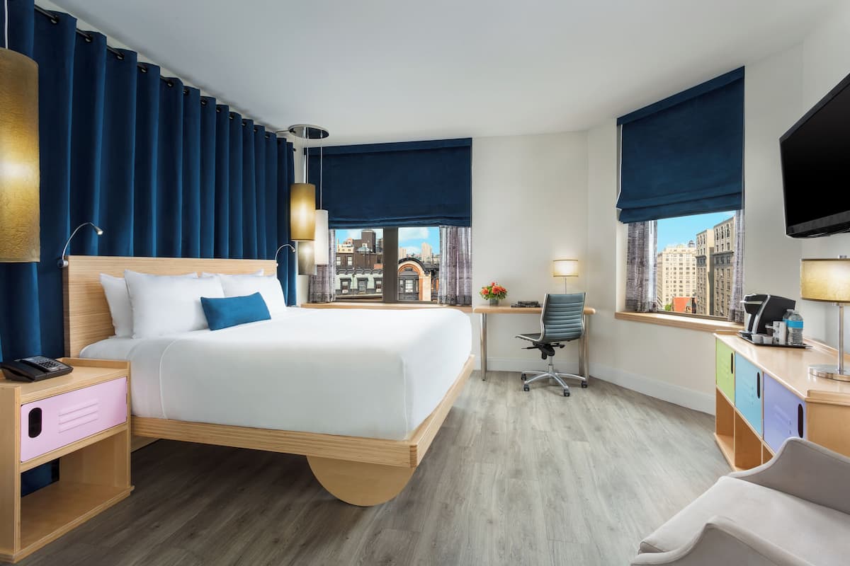 Deluxe Room, 1 King Bed (Broadway View) | Premium bedding, down duvets, pillow-top beds, in-room safe