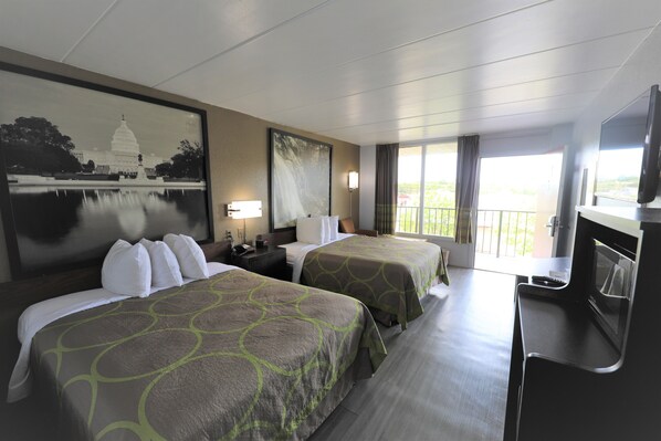 Desk, blackout drapes, iron/ironing board, free cribs/infant beds