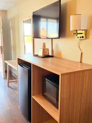 Desk, blackout drapes, iron/ironing board, free cribs/infant beds