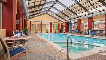 Indoor pool, open 8:00 AM to 10:00 PM, pool loungers