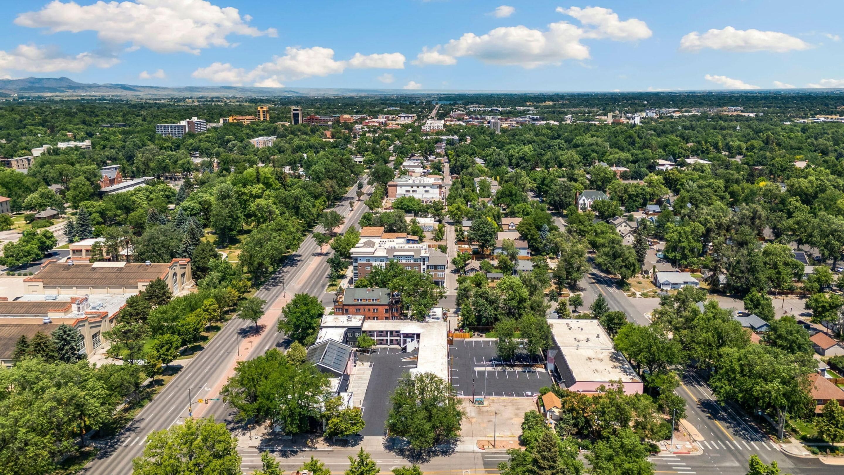 A grid-like town layout with intersecting roads and buildings.