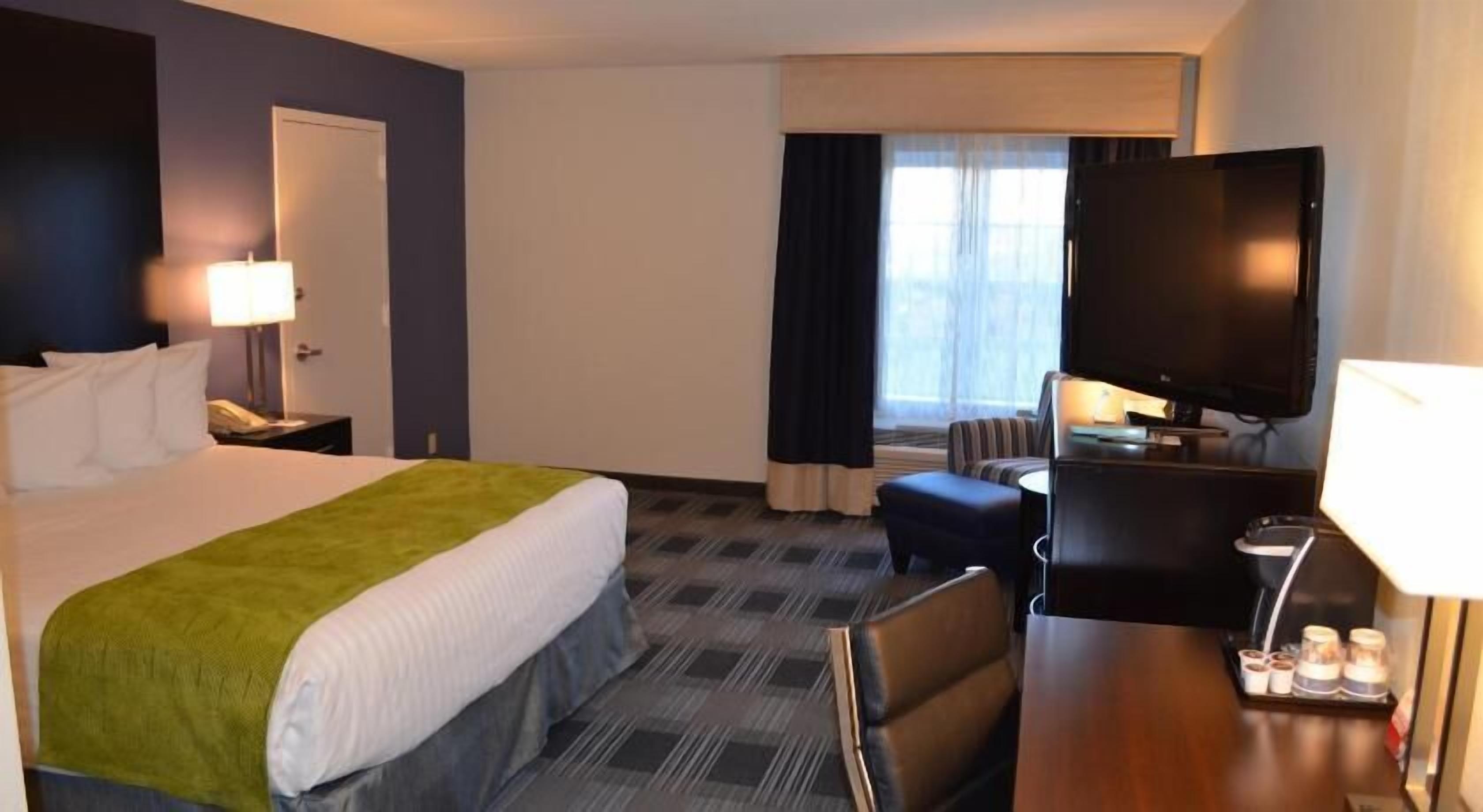Luxe beddengoed, pillowtop-bedden, een kluis op de kamer