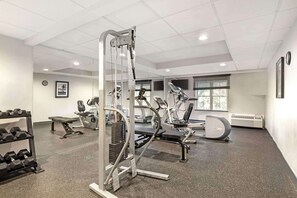 Stay fit on the go with our fully equipped gym featuring leg press, treadmills, and stationary bikes.
