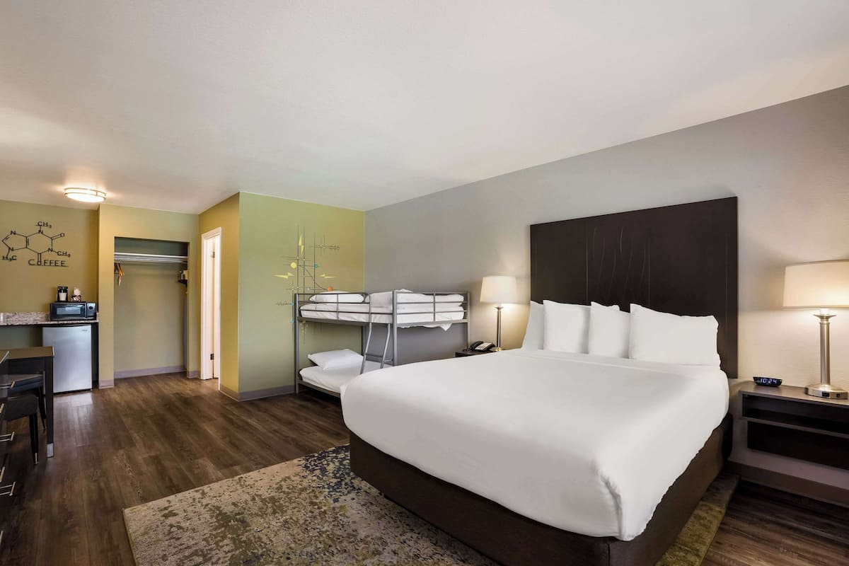 Standard Room, Multiple Beds, Non Smoking | Desk, laptop workspace, blackout drapes, iron/ironing board