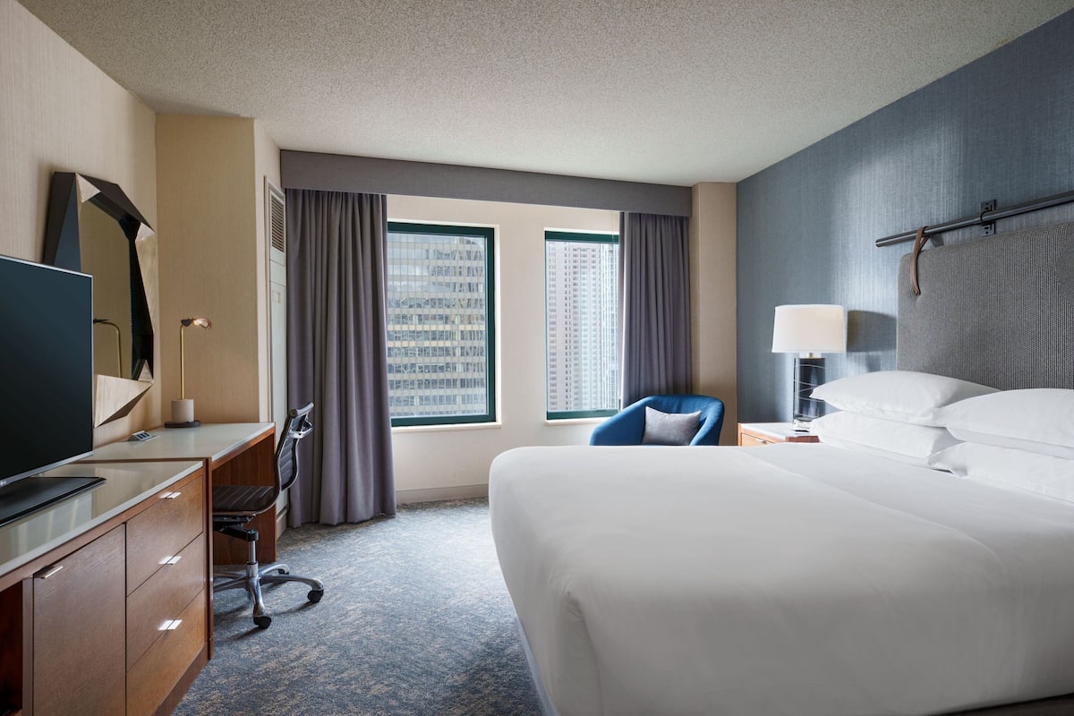 Down duvets, pillow-top beds, in-room safe, desk