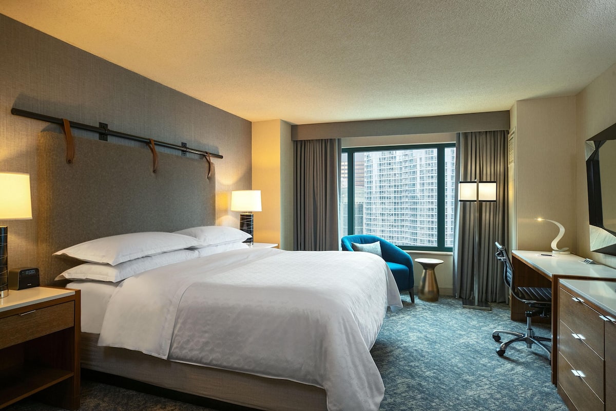 Down duvets, pillow-top beds, in-room safe, desk