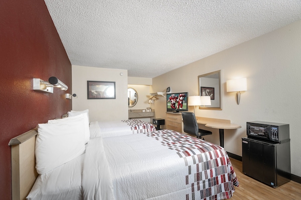Desk, blackout drapes, cribs (free), WiFi (free)